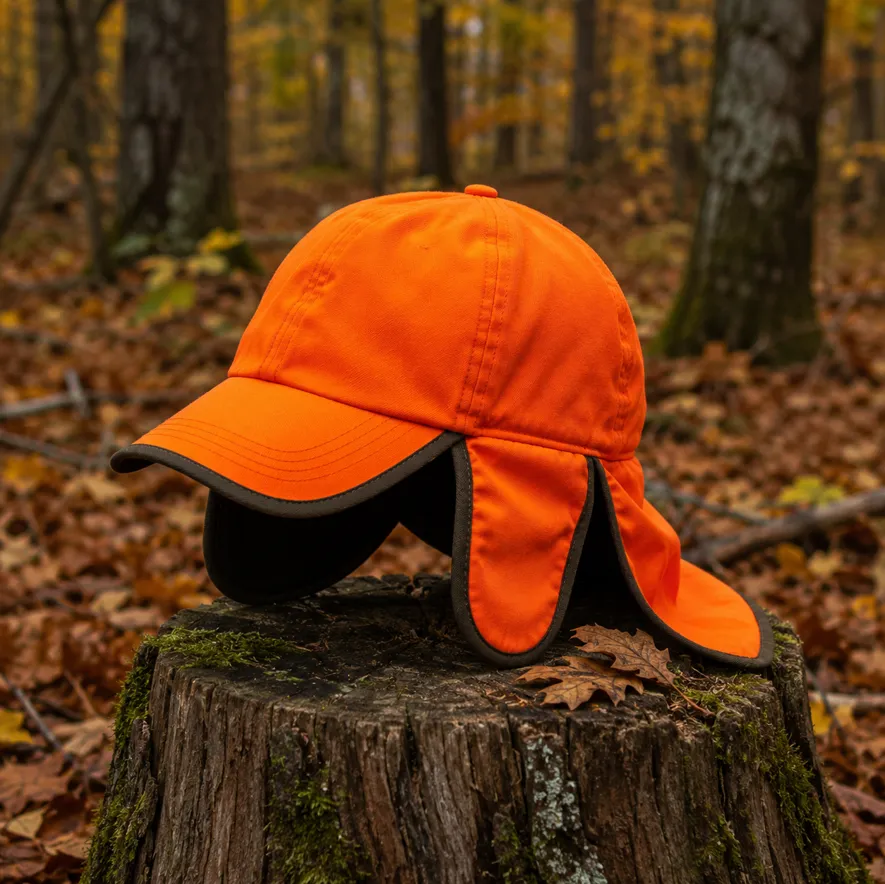 Jaktkeps i orangegul med nackskydd och öronskydd för vinterjakt